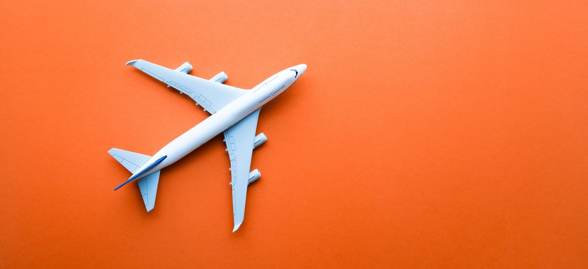 Plane on an orange background