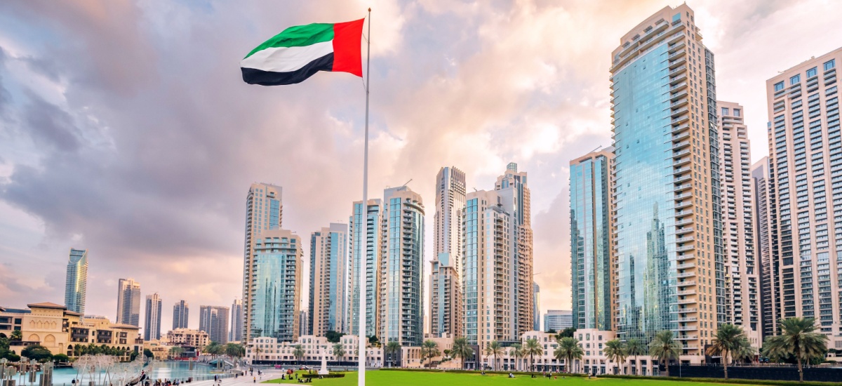 dubai bukdings and UAE flag
