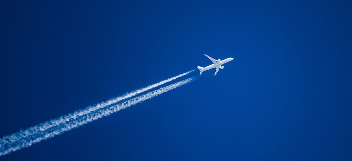 Plane on a blue sky background