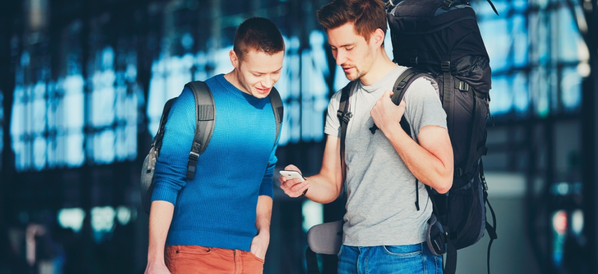 two-men-looking-at-phone