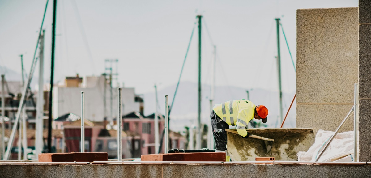 Spanish construction worker working on the foundations of a new building