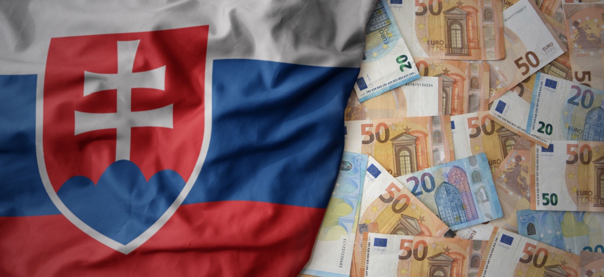 euro-notes-next-to-slovakia-flag