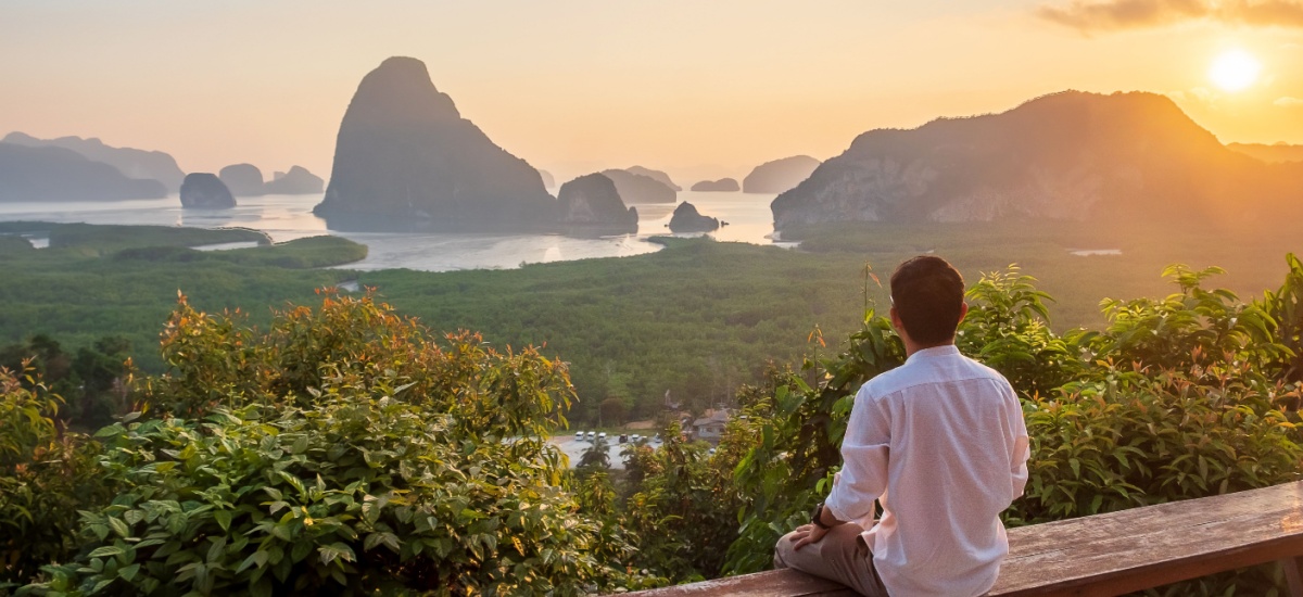 happy-traveller-enjoying-sunset-view