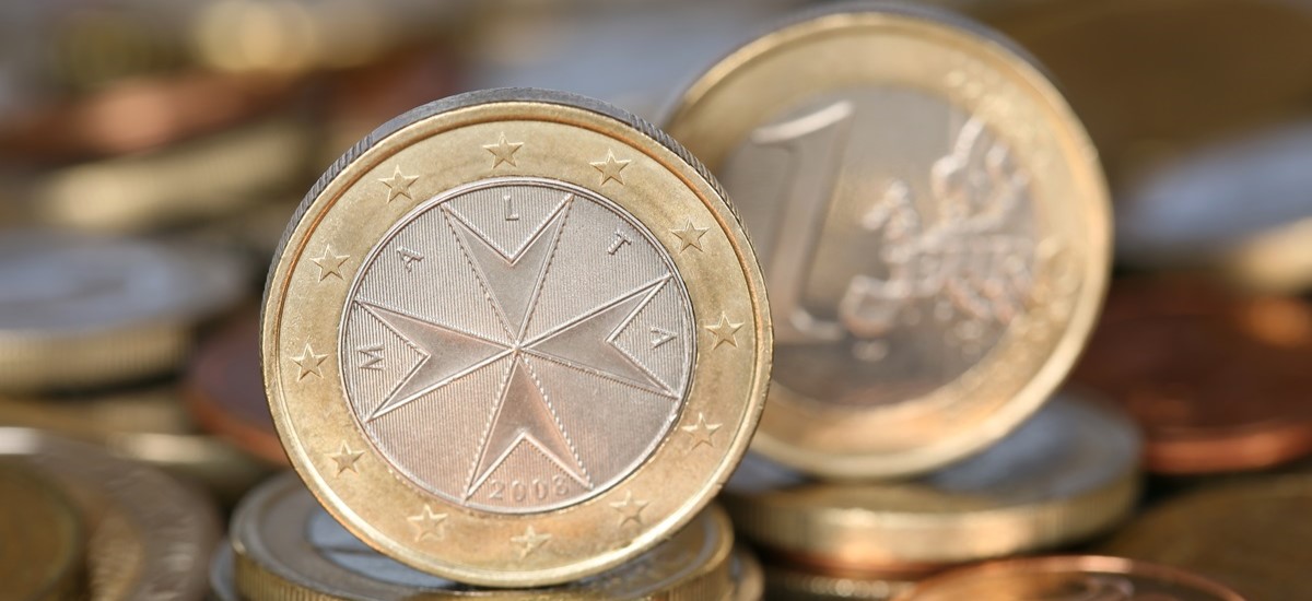 Close-up of Euro coins with Maltese design