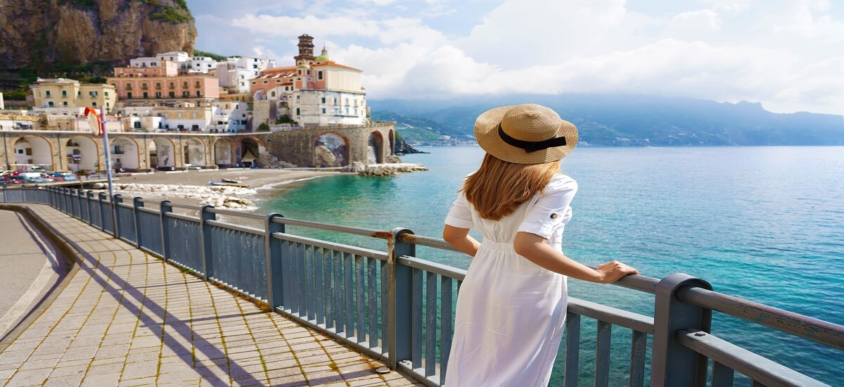 Woman looking out to sea in the Italian Riviera