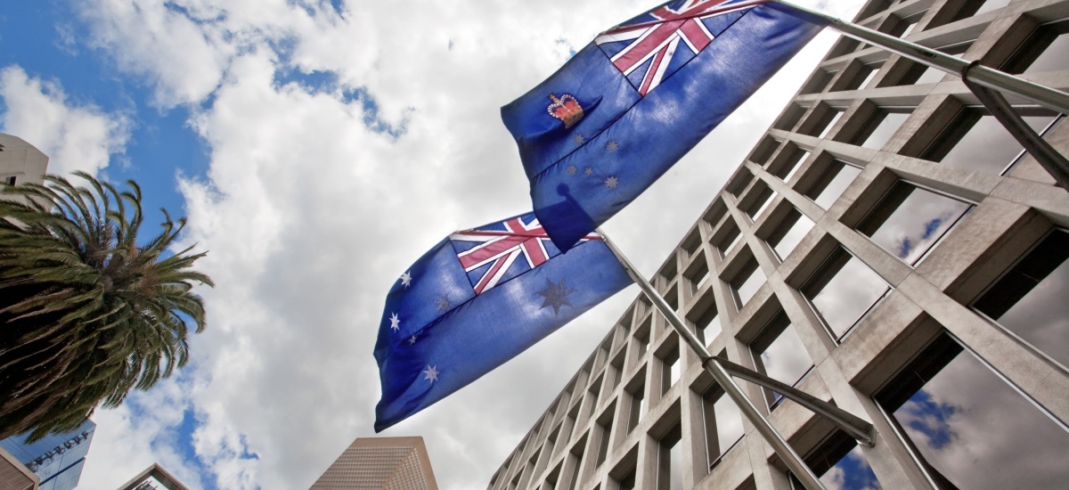 Australian flags flying on a government building