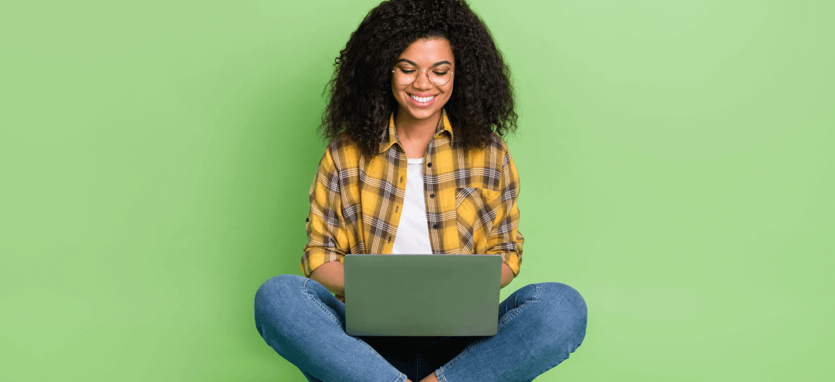 woman-with-laptop-green-background