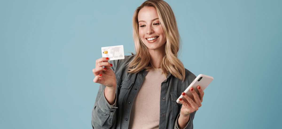 woman-holding-debit-card