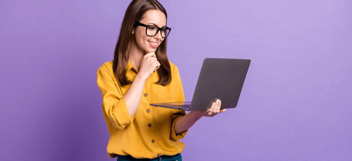 woman-with-laptop-purple-background