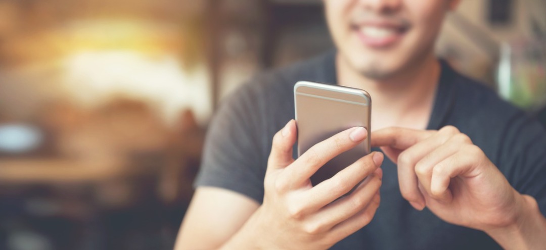 Man using his smartphone