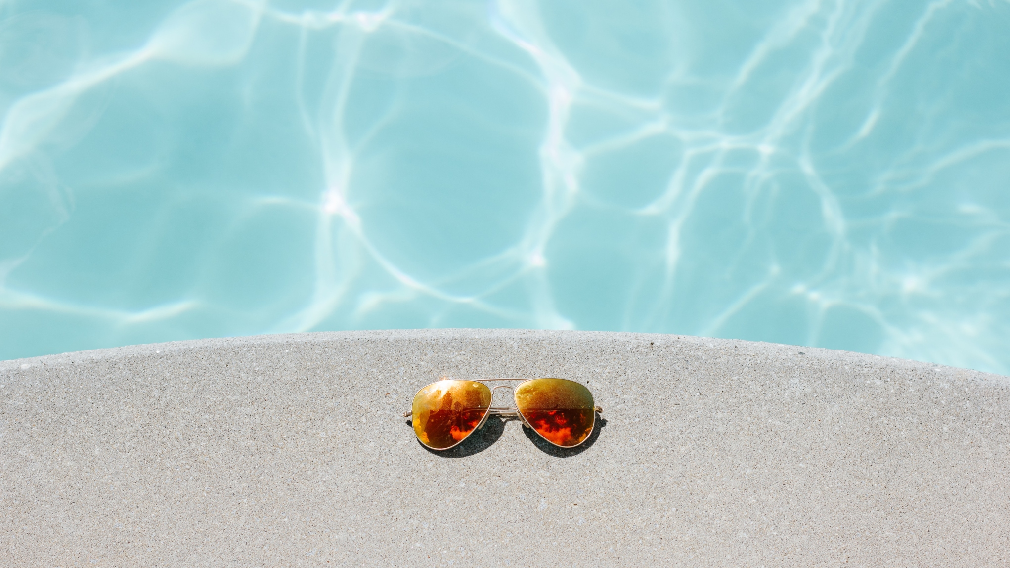sun-glasses-at-pool